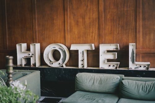 hotel-sign-behind-sofas