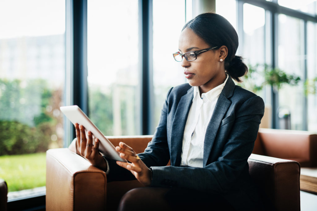 Office Employee Using Digital Tablet