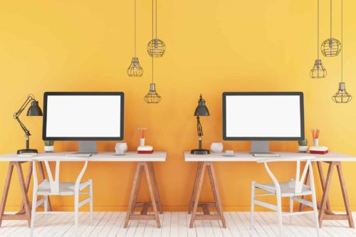 Workspace with Two Blank Computer Screens