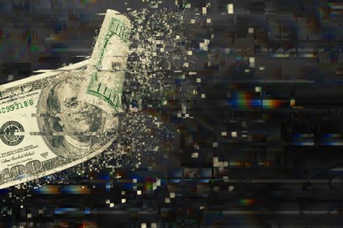 An edited image of a 100 dollar bill (US) disintegrating into a digital landscape